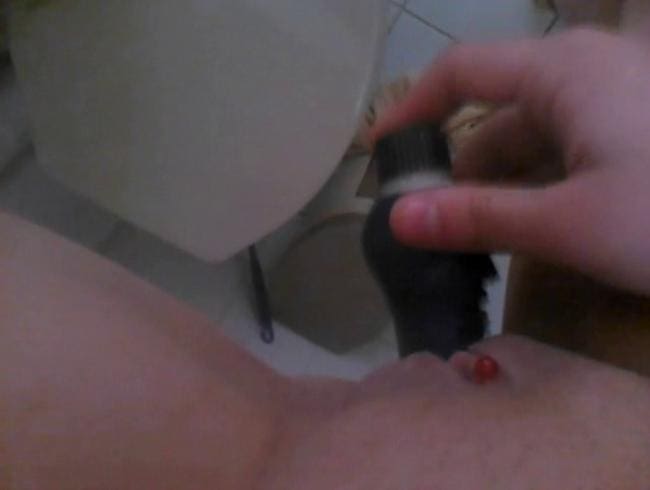 Dildo auf dem Klo